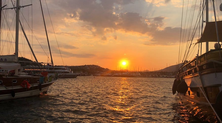 Bodrum marina transfer and yacht sunrise view
